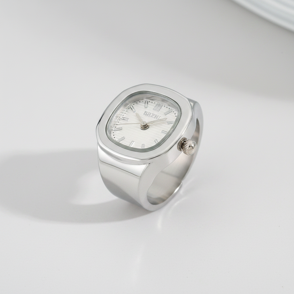 Silver watch with a white face on a white background